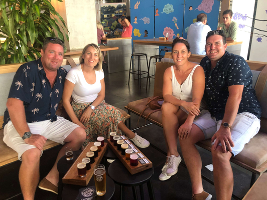 GOLD COAST Friends with beers at Burleigh Brewing