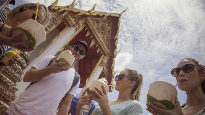itinerary_lg_Thailand_Bangkok_Wat_Po_Coconut_Drink_Travellers_Group_Yolo-Jordan_Lloyd_2013-IMG01210_Processed_Lg_RGB.jpeg