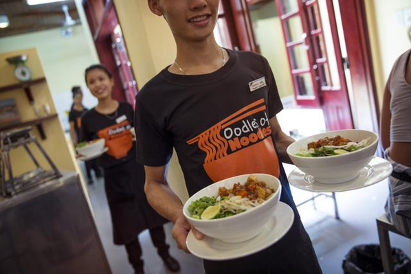 Vietnam Planeterra Oodles of Noodles Student Serving Food .jpg